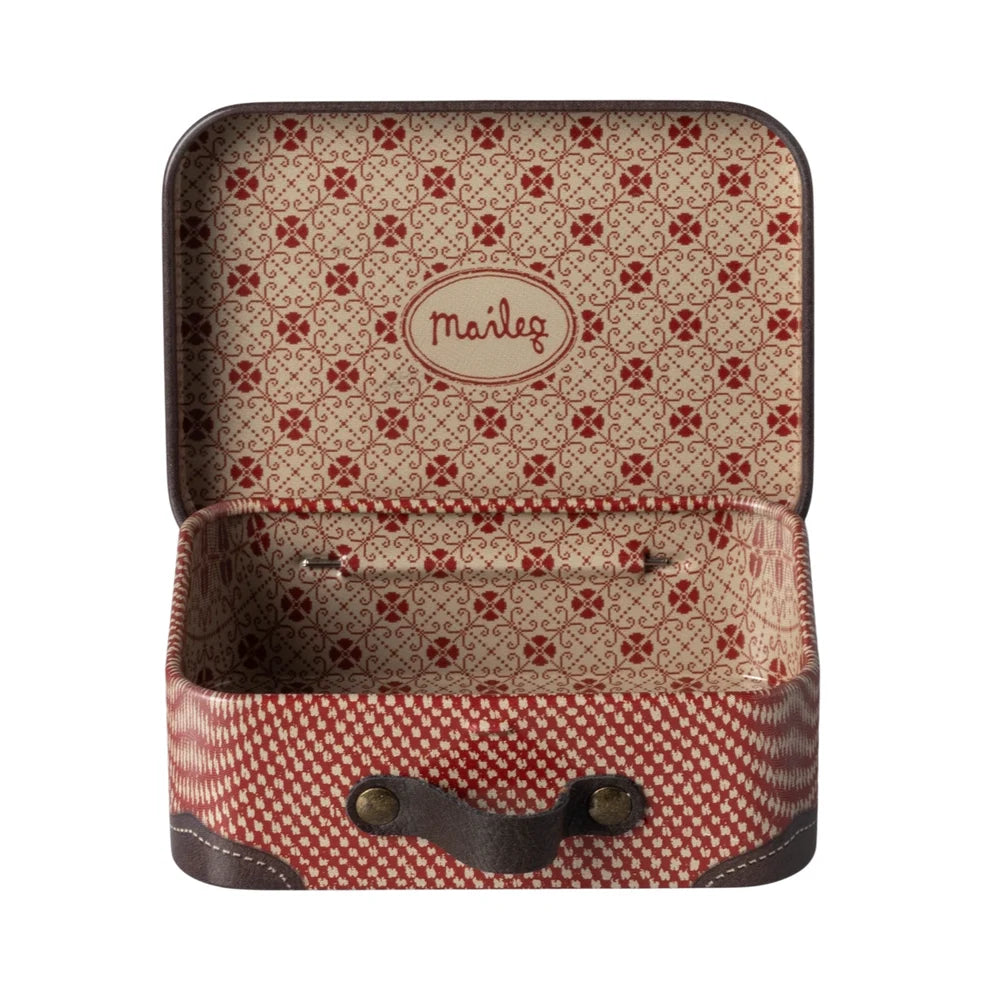 Patterned backpack with visible brand name on a white background