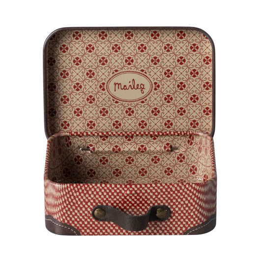 Patterned backpack with visible brand name on a white background